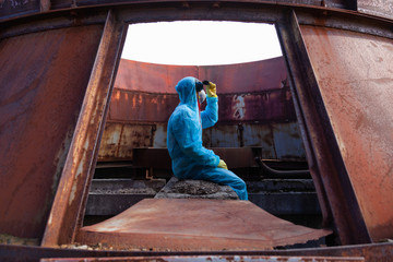 man environment mask dark facemask icon protective overall blue orange rast factory disused catastrophe chernobyl