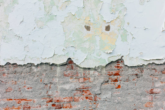 Peeling paint and exposed old brick wall,Peeling paint and exposed old brick wall