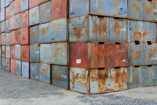Stack of rusty metal containers ,Stack of rusty metal containers used for apple storage during harvest
