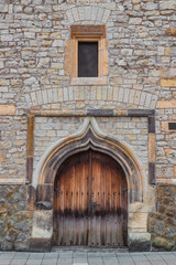 Fototapeta na wymiar Old wooden church door and window