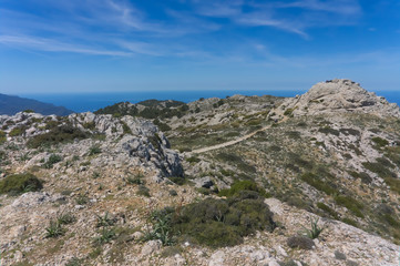 Fototapeta na wymiar Mallorca. Mountain range Serra de Tramuntana. Mountain peaks and valleys on the way to Sa Calobra bay