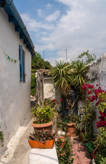 Narrow steps in ancient neighborhood of Anafiotika in Athens by the Acropolis