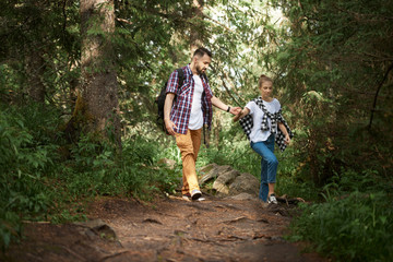 Fototapeta premium Couple hiking in the forest