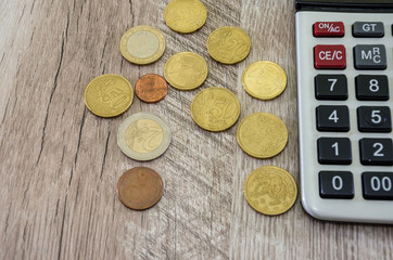 Coins and calculator. Close-up. View from above.
