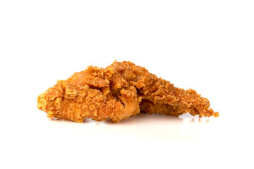 Fried chicken fillets on a white background. Fried chicken nuggets close-up.