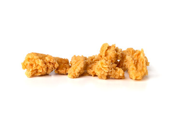 Slices of roasted meat on a white background. Fried chicken fillet close-up.