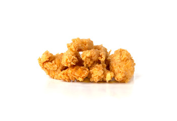 Slices of roasted meat on a white background. Fried chicken fillet close-up.
