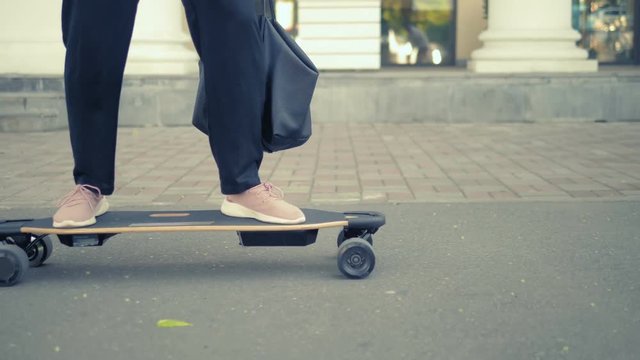 Portrait of a handsome man with a mask under the lower eyelid, which is shaved with a straight razor in the bathroom. Metrosexual concept