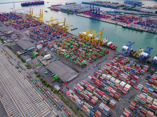 Aerial top view of container cargo ship in the export and import business and logistics...