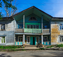 porch of the old wooden decaying mansion