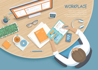 Мan writing notes in a planner at a round wooden desk. Workplace Desktop Workspace Office supplies, monitor, book, phone, glasses, pen, paper, tea, donut, purse. Vector Top view 