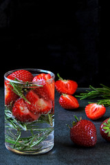 Tonic detox drink with strawberries and rosemary. Summer strawberry drink. Keto diet. Keto drinks.