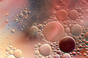 Colourful oil ink bubbles and drops. Abstract template mixed texture background. Wallpaper pattern.