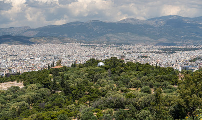 Fototapeta na wymiar City of Athens taken from the summit of Filopappou Hill