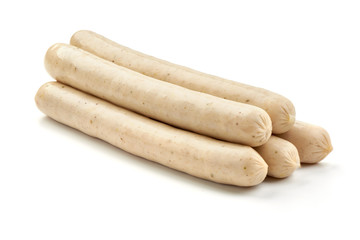 White Polish sausages for barbeque or grill, close-up, isolated on white background