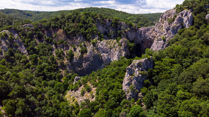 Aerial view of mountain and forest by the Vratna river in Serbia