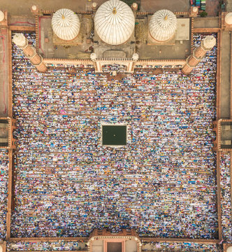 Aerial view of prayer during Eid al-Fitr at Jama Masjid in Delhi, India.