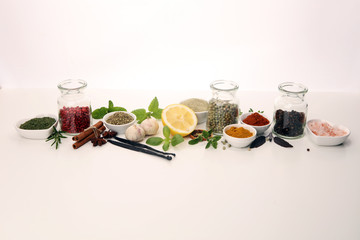 Spices and herbs on table. Food and cuisine ingredients with basil