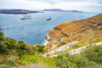 Obraz premium Panoramic View of Port, Cable Car, Teleferic, in Santorini Island in Greece, Shot in Thira