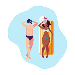 interracial couple with float mattress in water