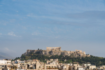 Fototapeta na wymiar Acropolis hill with the city of Athens surrounding it