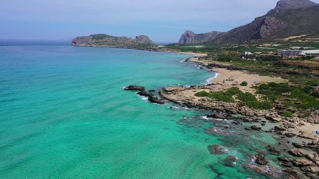 Aerial drone top view video of famous paradise sandy deep turquoise beach of Falasarna in North West Crete island, Greece
