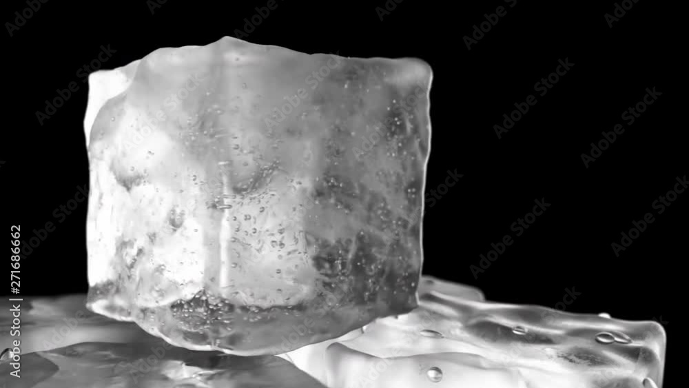 Poster looping rotation of ice cubes on a black isolated background with depth of field. seamless loop 3d a