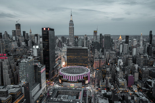 view from top on Madison Square Garden and Empire State Building. Night Lights