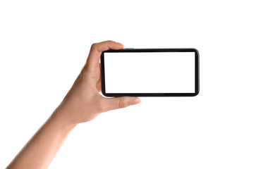 Woman holding smartphone with blank screen on white background, closeup of hand. Space for text