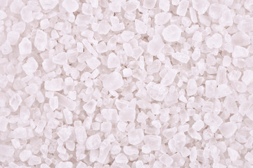 Top view on background texture of coarse salt. Copy space for your text.