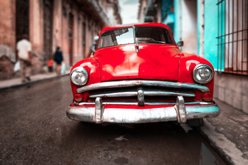Old car on a narrow street in Old Havana