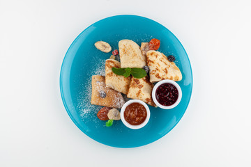Crepes with jam and dried fruit