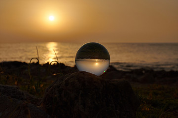 Fototapeta na wymiar Tramonto Salentino nella sfera di cristallo