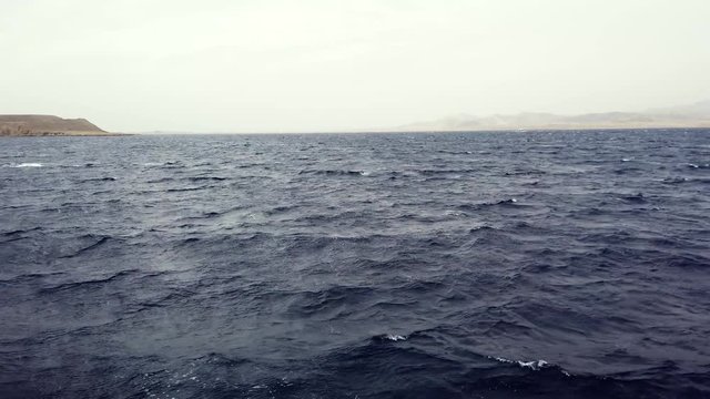 Yacht sailing on opened sea. Sailing boat. Yachting video. Sailing video. Yachting at windy day. Yacht. Sailboat.