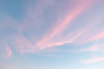 pretty airy pastel colour sky pink purple blue with fluffy cloud for background textures