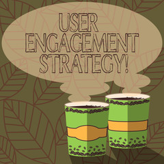 Writing note showing User Engagement Strategy. Business photo showcasing Enhancing the job perforanalysisce of individuals Two To Go Cup with Beverage and Steam icon Blank Speech Bubble photo