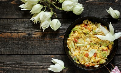 Yucca flowers dish. flower petals fried with eggs and tomatoes. national cuisine of Costa Rica. edible flowers recipe. Yucca is the national flower of Costa Rica