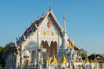 Wat Chiang Rai (or White temple) an ornate little temple with mirrored tiles located in the centre...