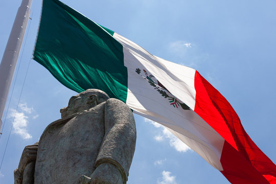 Statue of Manuel Jose Othon with Mexican Flag