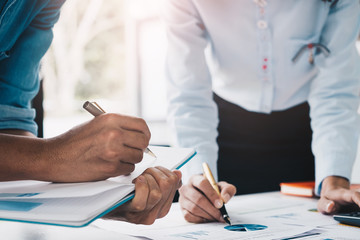 Close up Business people meeting to discuss the situation on the market. Business Financial Concept