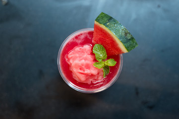 red watermelon frappe, mint leaf on top