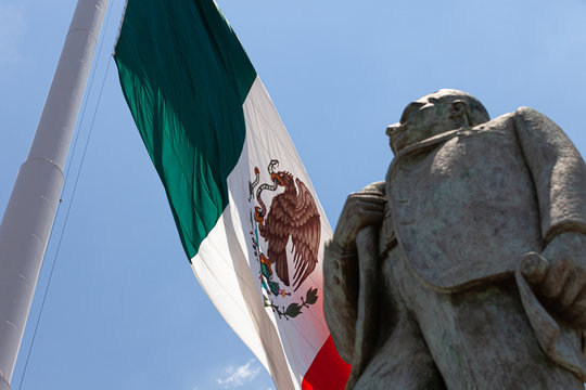 Statue of Manuel Jose Othon with Mexican Flag