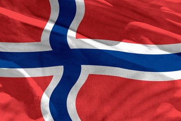Fototapeta premium Waving Norway flag for using as texture or background, the flag is fluttering on the wind