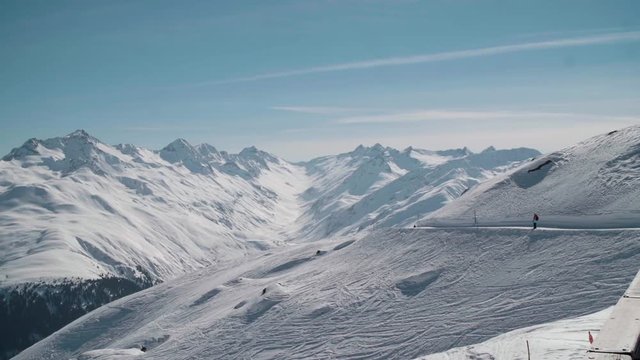 Skier skis off to bigger mountains in the Swiss Alps