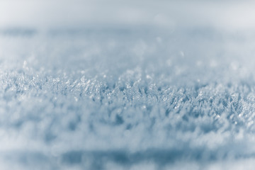 Obraz premium Winter background, frost, ice crystals close up