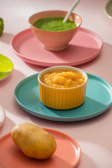 Natural baby food concept. Different types of vegetable puree on the light background