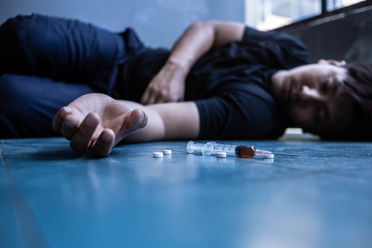 Asian men are drug addicts to inject heroin into their veins themselves.Flakka drug or zombie drug is dangerous life-threatening,Thailand no to drug concept
