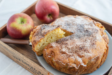 home made sweet apple pie with red apples