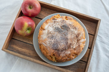home made sweet apple pie with red apples
