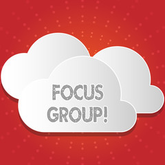 Conceptual hand writing showing Focus Group. Concept meaning showing assembled to participate in discussion about product White Clouds Cut Out of Board Floating on Top of Each Other